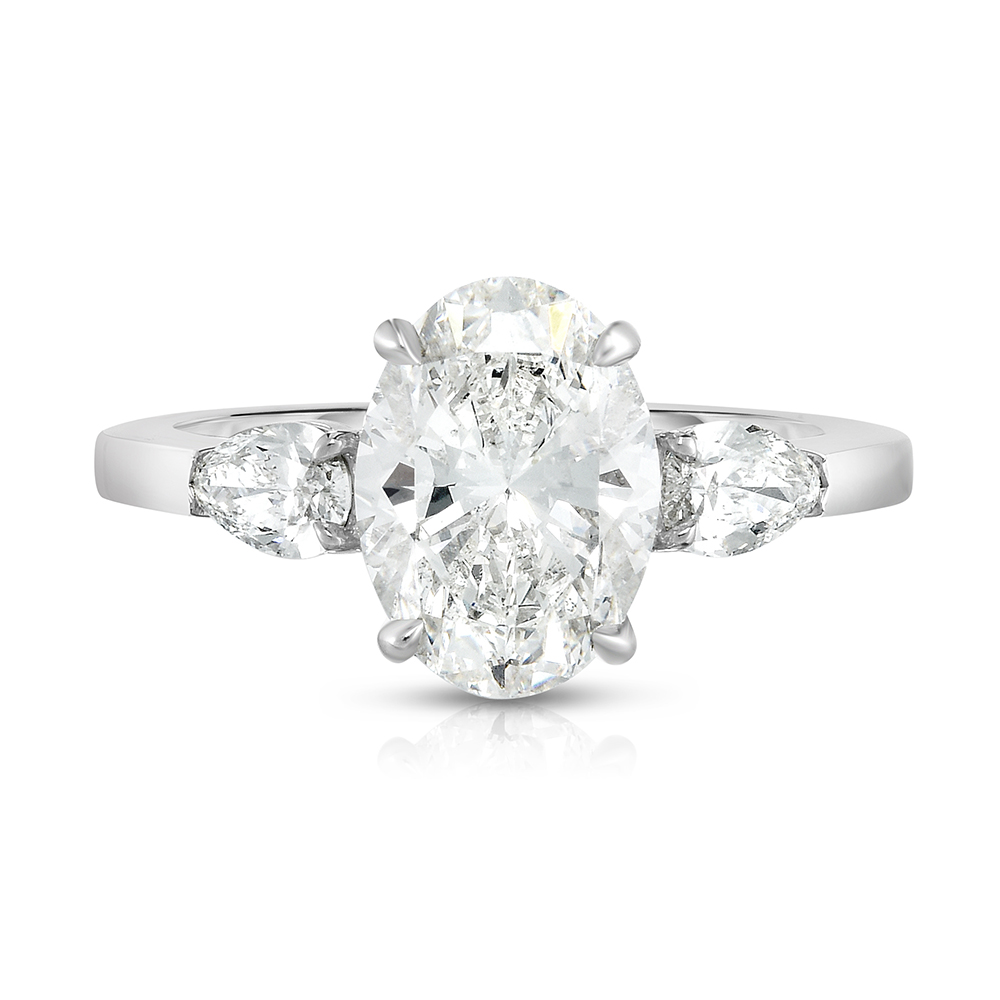 The Oval Cut Diamond Three Stone With Pears | Marisa Perry by Douglas Elliott